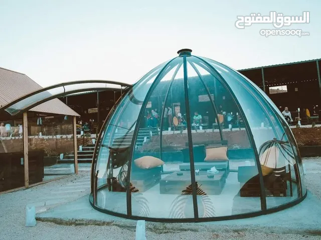 قبب ببلز (BUBBLES) للجلسات الخارجية الشتوية