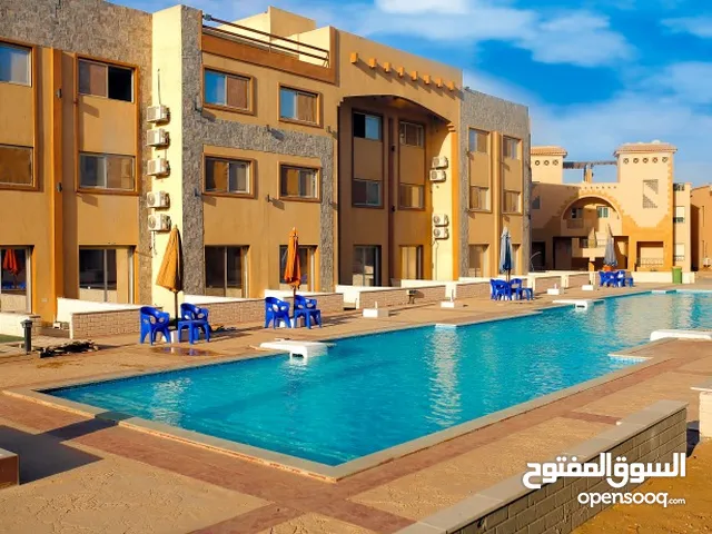 شاليه للبيع في العين السخنه 50م Laluna Azure استلام فوري متشطب بالفرش والتكيفات View Swimming Pool