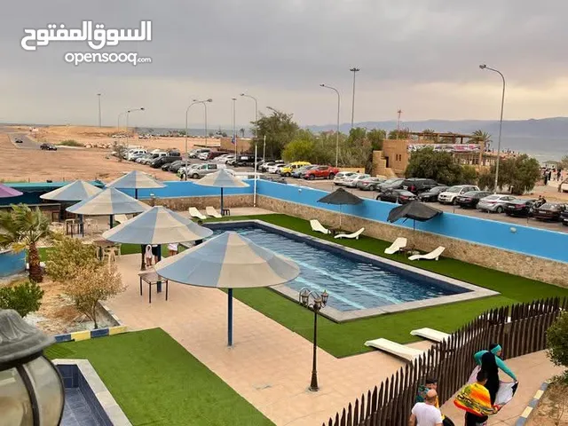 دعم حكومي 50% على شقق العقبة فندق ومنتجع الاربعة نجوم مميزة الشاطئ الجنوبي