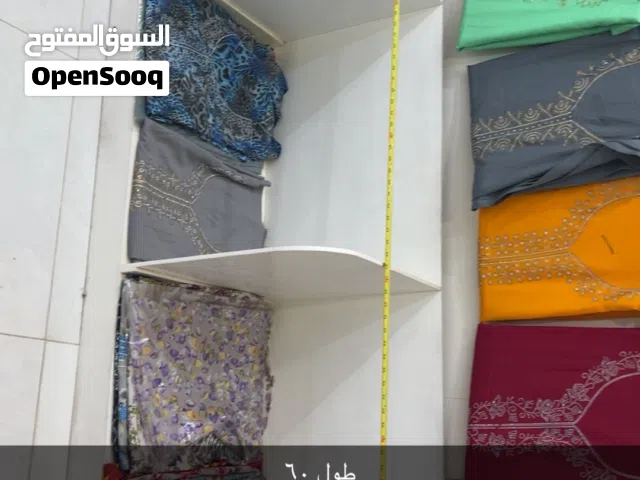 قواعد خشب لرص الاقمشه او المخاوير
