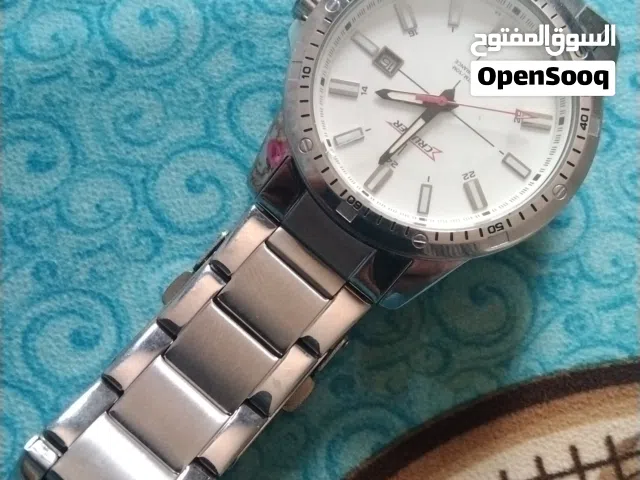 ساعه ومحفظه وبطايق تعبئه
