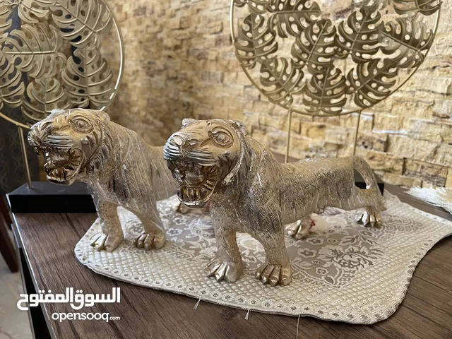 تحف ( تماثيل زخرفيه) على شكل نمرين