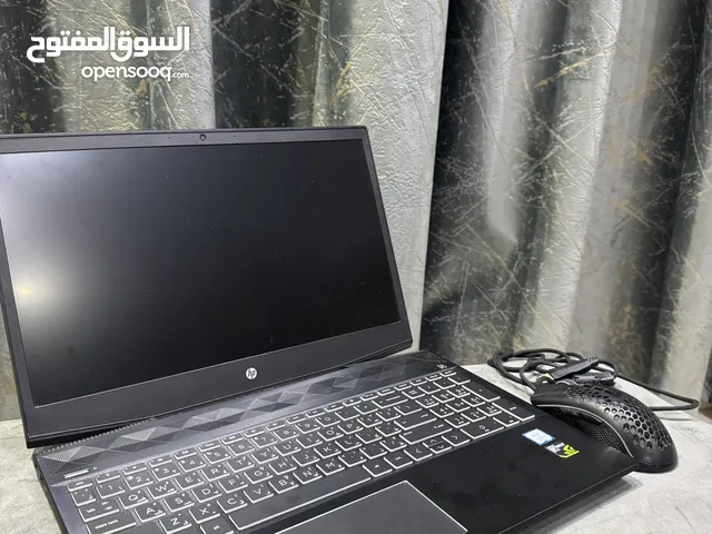 Hp pavilion gaming laptop with a gaming mouse