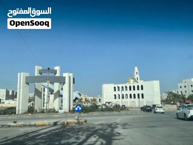 قطعة ارض تجارية للبيع مساحتها 1080 واجهه ع شارع اربد عمان بتجاه دوار الطيارة واجهه 25م