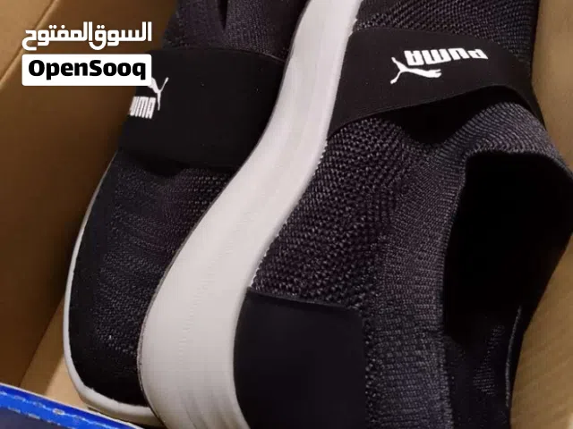 حذاء جديدبوما اسود ونيلي رقم 41