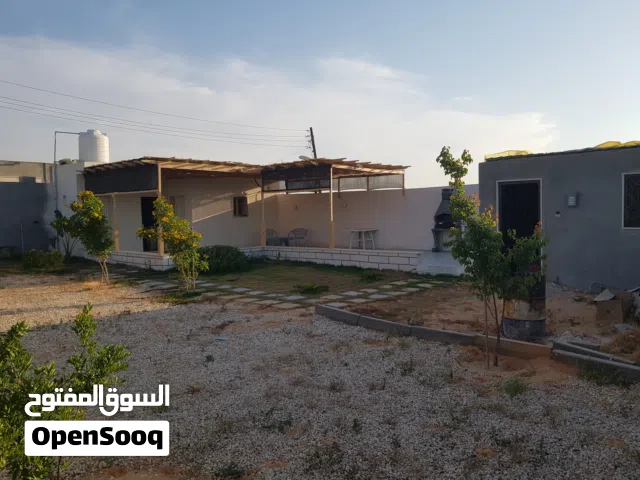 أرض للبيع 350 متر واجهتين بها دار وحمام ومستراح فى وادى الربيع المظل