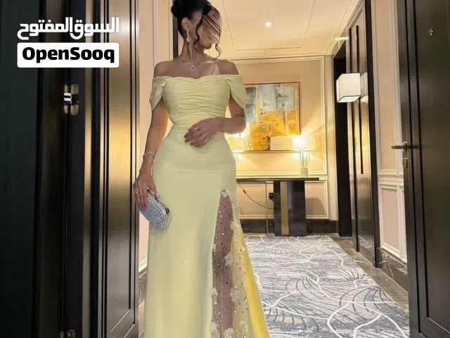 فستان سهرة اصفر قياس 42