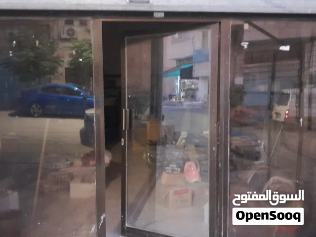 رفوف محلات حديد وزجاج+واجهة باب المينيوم زجاج