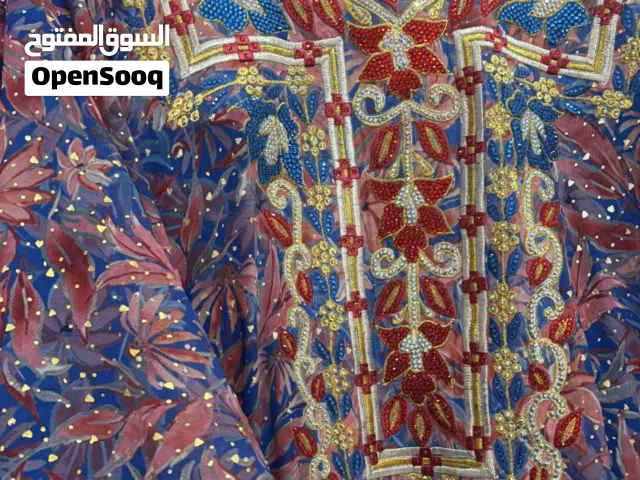 خليجي ازرق ملكي مع احمر ،، الخام شيفون اصلي مع كريستال ولمعه