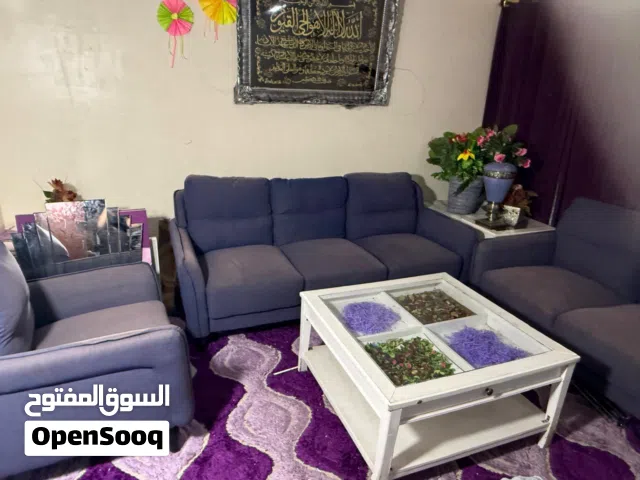 Six seater sofa with center table