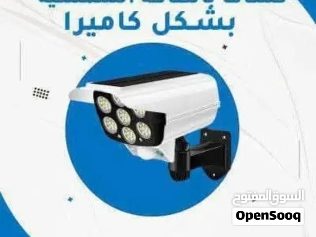 كشافات على شكل كاميرا حساس حركة ابو لوح شمسي ابو ريموت تحكم  بثلاثة مواضع للاضواء يضي حين تحرك اي جس