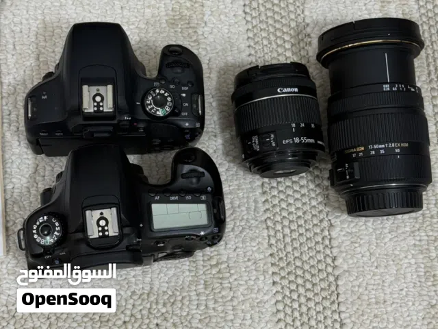 كيمرات كونون مع عدسات وصف مهم