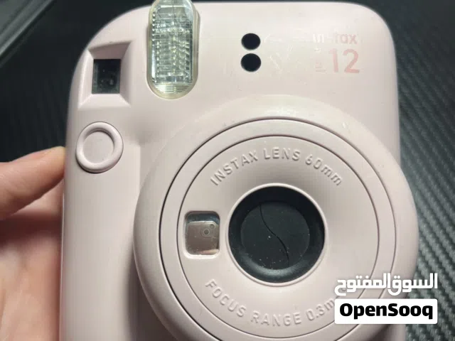 كاميره فوريه لون وردي نوع instax 12 mini