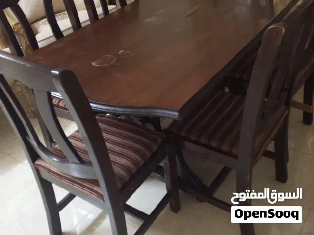 طاولة سفرة مستعملة بحالة الوكالة مع 6 كراسي