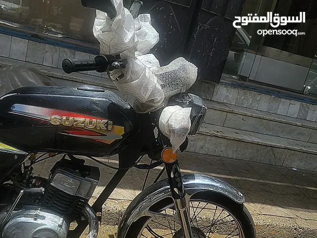 دراجة نارية سوزوكي AX100 موديل 2006 بحالة ممتازة