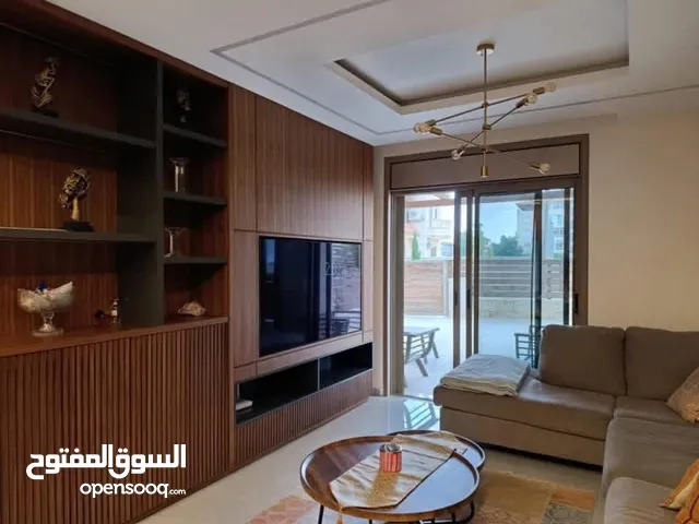 شقه للبيع مع حديقه في المصيون خلف البنك العربي