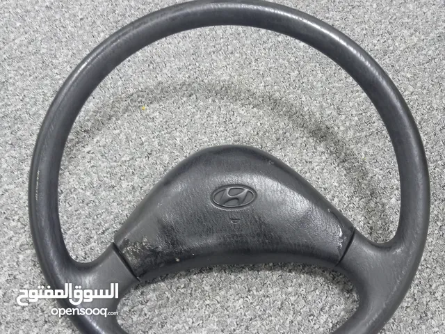طارة اكسينت اصلية طارة هونداي مع عامودها