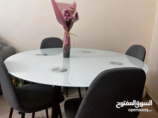 Round Glass Dining table with chairs