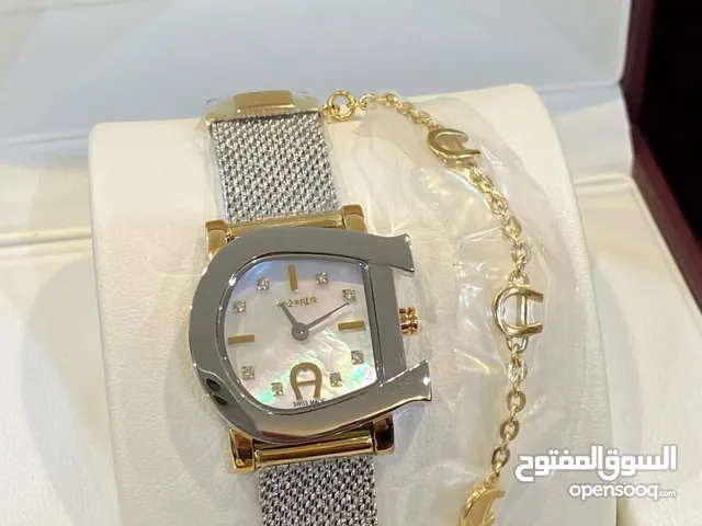ساعة اجنر مع اسوارة جميلة اصليه مع جميع المرفقات 2025.