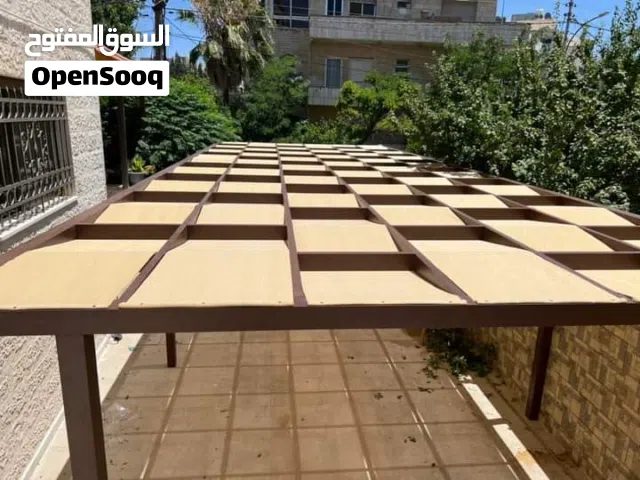 تركيب مظلات برغولات الحدائق والمنازل والبلكونات باسعار مميزة  تركيب مظلات براكولات خشب او حديد مع اش