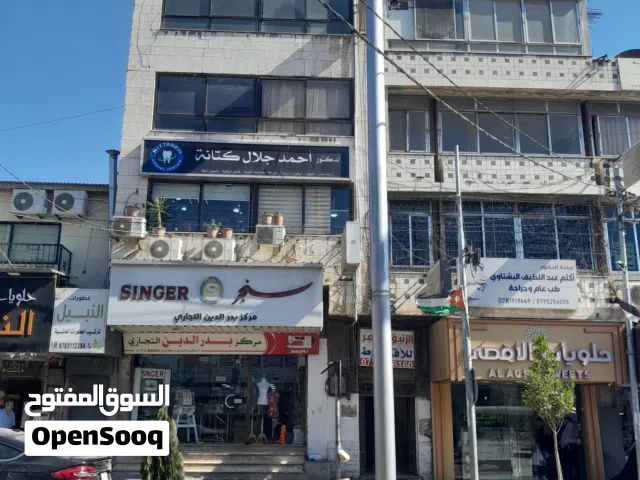 بناية وسط البلد بجانب حلويات الاقصى ثلاثة طوابق وتسوية بدون المحل للبيع