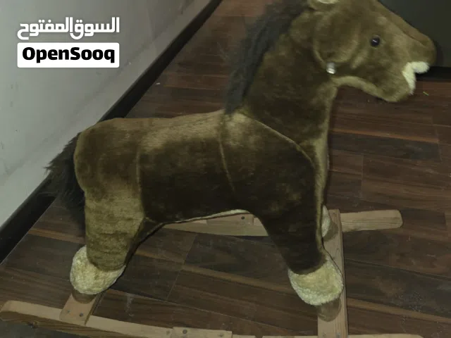 عدد 2عربية لعب اطفال وعدد 1دراجة لعبة اطفال وعدد ا بيانو وحصان هزاز بحالة جيدة