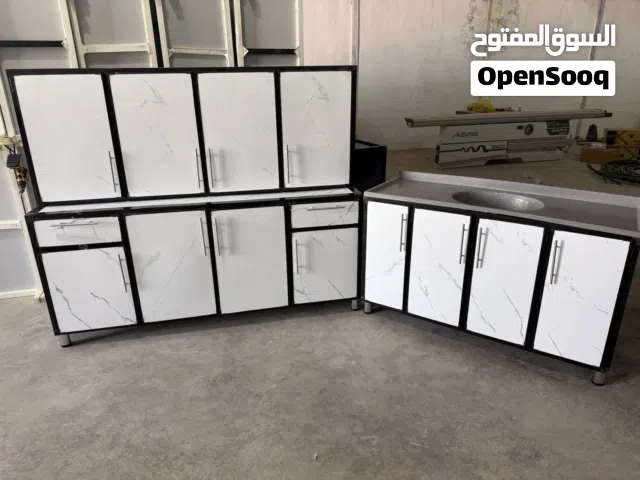 كاونتر مترين ارضي وملحق وسنك متر ونص داخل وضهر بليت