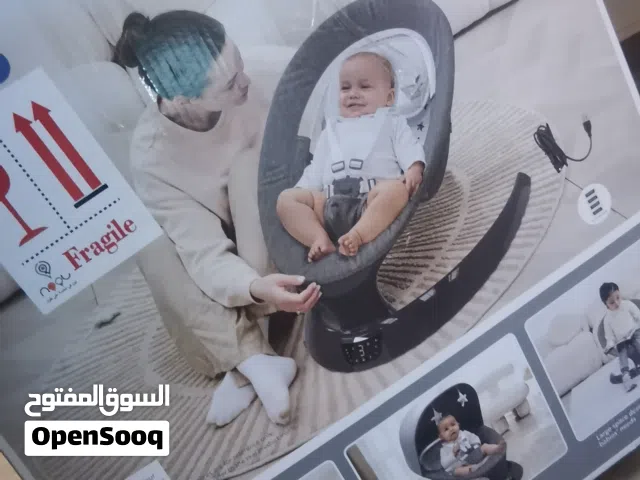 هزاز أطفال يشتغل مراحل مع الموسيقى