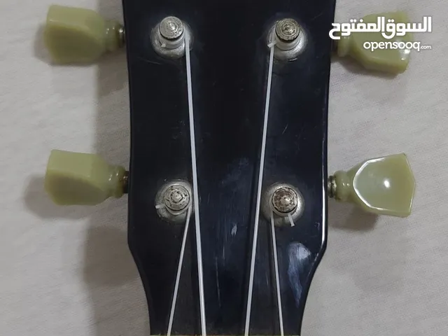 جيتار أسود نوع يوكليلي صغير مستعمل أخو الجديد و بسعر