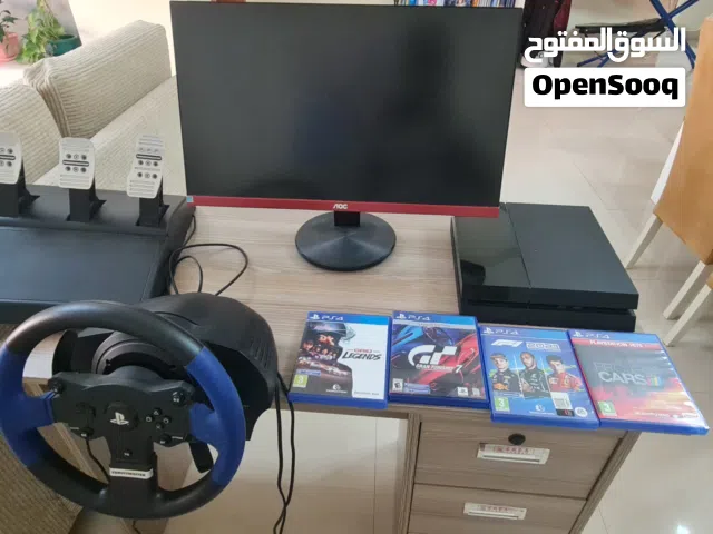 SIM RACING SETUP WITH PS4 ,4 GAMES AND MONITOR