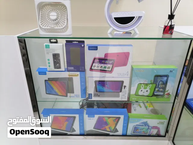 محل بيع هواتف متنقلة وحاسب آلي