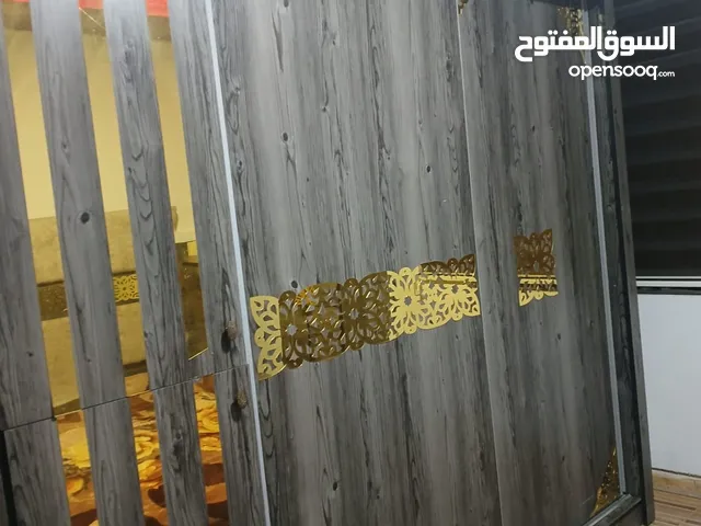 غرفة نوم وكنب وصوبه