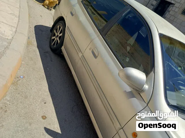 2002 كيا ريو Standard