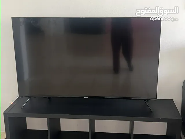 تلفزيون 55 بوصة مع طاولة Haier Smart TV