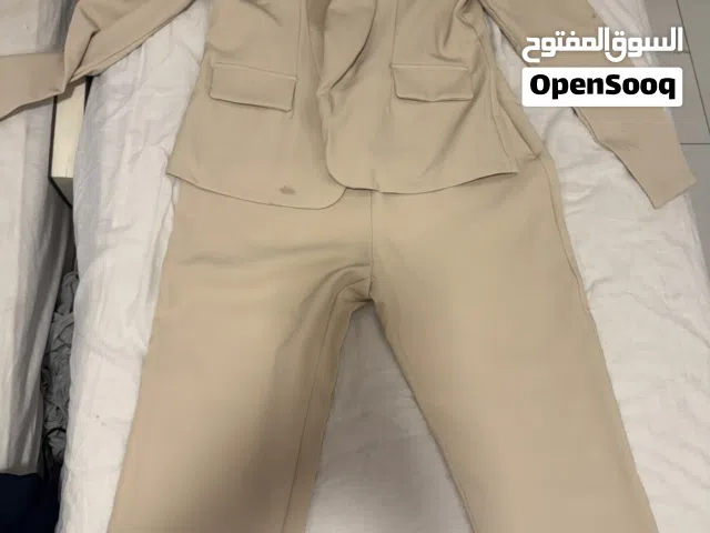 طقم رسمي بيج