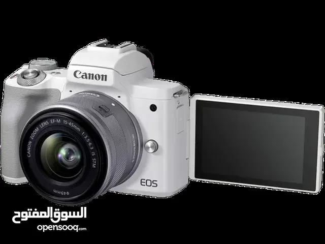 Mirrorless 4k Canon M50 mark ii مع ملحقاتها من مايك و ترايبود و عدسة اضافية و ادابتر