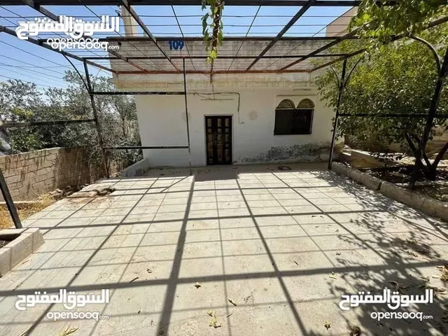 بيت مستقل مع ارض مشجرة بحي جعفر الطيار