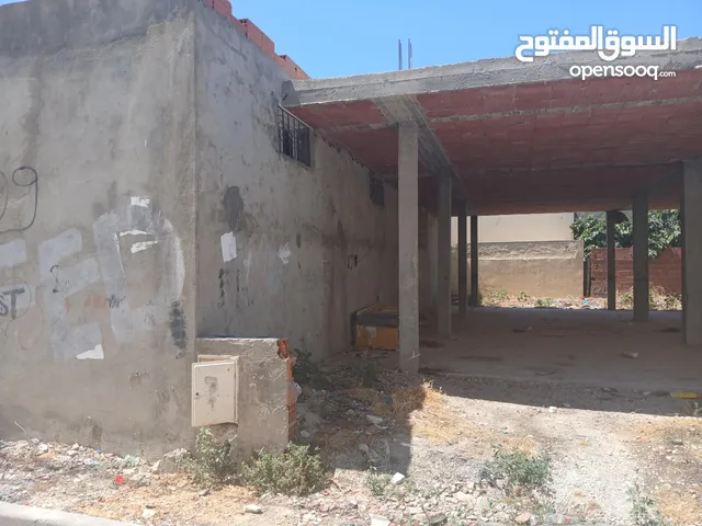 عقار منزل و 4 محلات (تحت الكراء ) مسجل ف دفتر خانه تشري من اول شهر تخلص عقار فرصه ورابح فيه