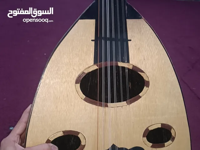 آلة موسيقية عود صناعة محلية بصنعاء ( صناعة الأستاذ شوقي )  بحالة جديدة نظيفة