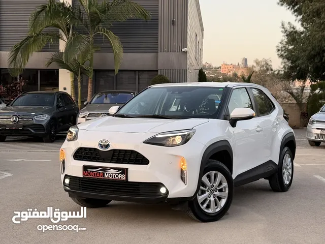 تويوتا ياريس كروس ترخيص 2022 محرك 1500 هايبرد جير أوتوماتيك 172 حصان