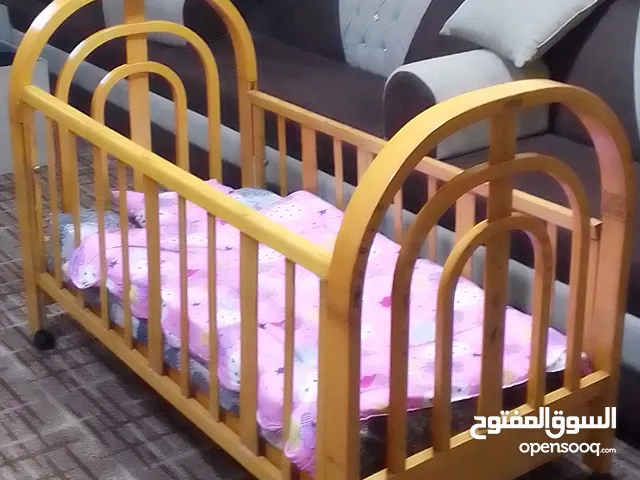 سرير اطفال خشب زان طول 135سم عرض 70سم
