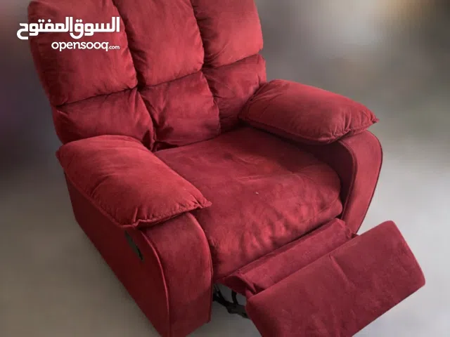 الكنب الهزاز مع مسند رجل يرتفع