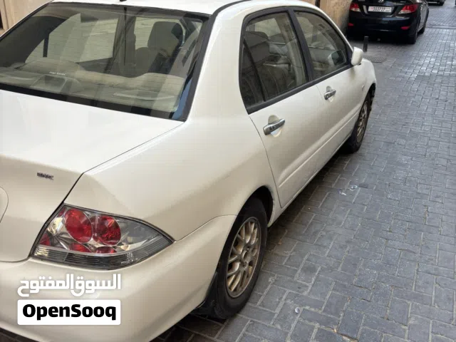2004 ميتسوبيشي لانسر Standard