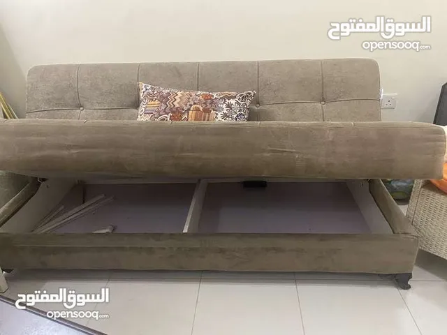 صوفا bed للبيع تفصيل مشغل حركات و موجوده على صفحتهم  مكتب تفصيل للبيع خشب  كرسيين رتان ساحوري