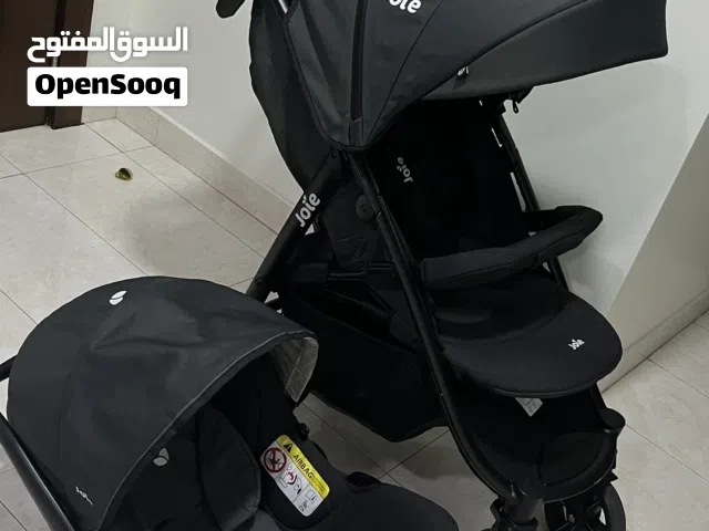 عربة اطفال مع مقعد السيارة ماركة Joie