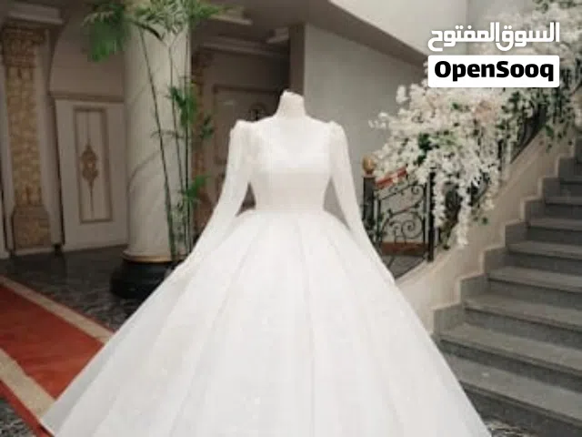 فستان زفاف مستعمل  بسعر 7 الاف و500 جنية واللي عاوز فيديو للفستان يبعت لي رسال  واتساب في فيديو جاهز