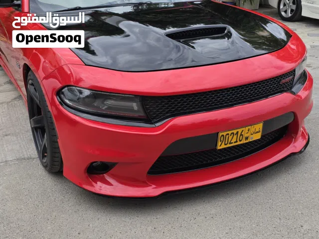 دودج تشارجر SRT 392 2015 أحمر موديل فخم مع تقنيات حديثة وحالة ممتازة