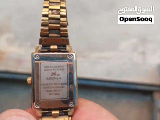 ساعه قديمه  مطليه بذهب 22
