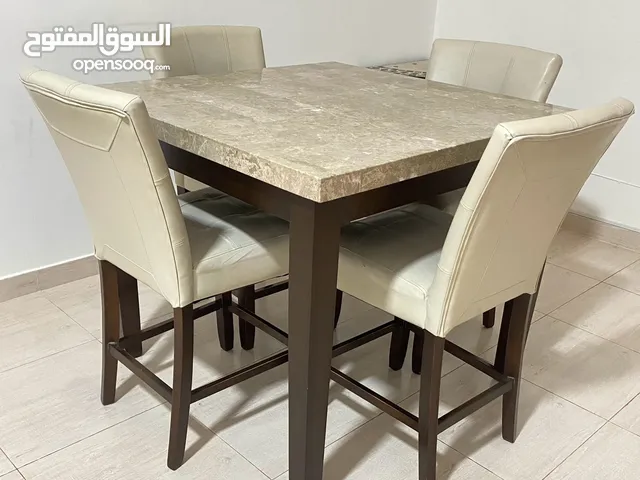 Urgent sale!! Marble top dining table with four chairs