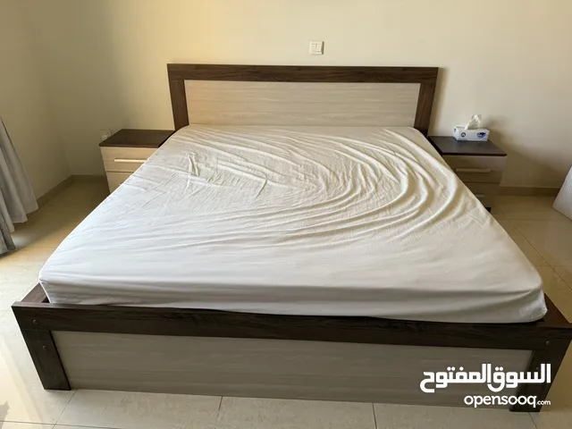 King bed with mattress and two nightstands